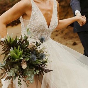 5’6” wearing 3” heels, size 2 dress, 34B, 127lb